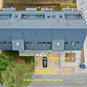 Ferienwohnung-parkplatz-balkon-kueche-aufzug-smarttv-waschtrockner Apartment
